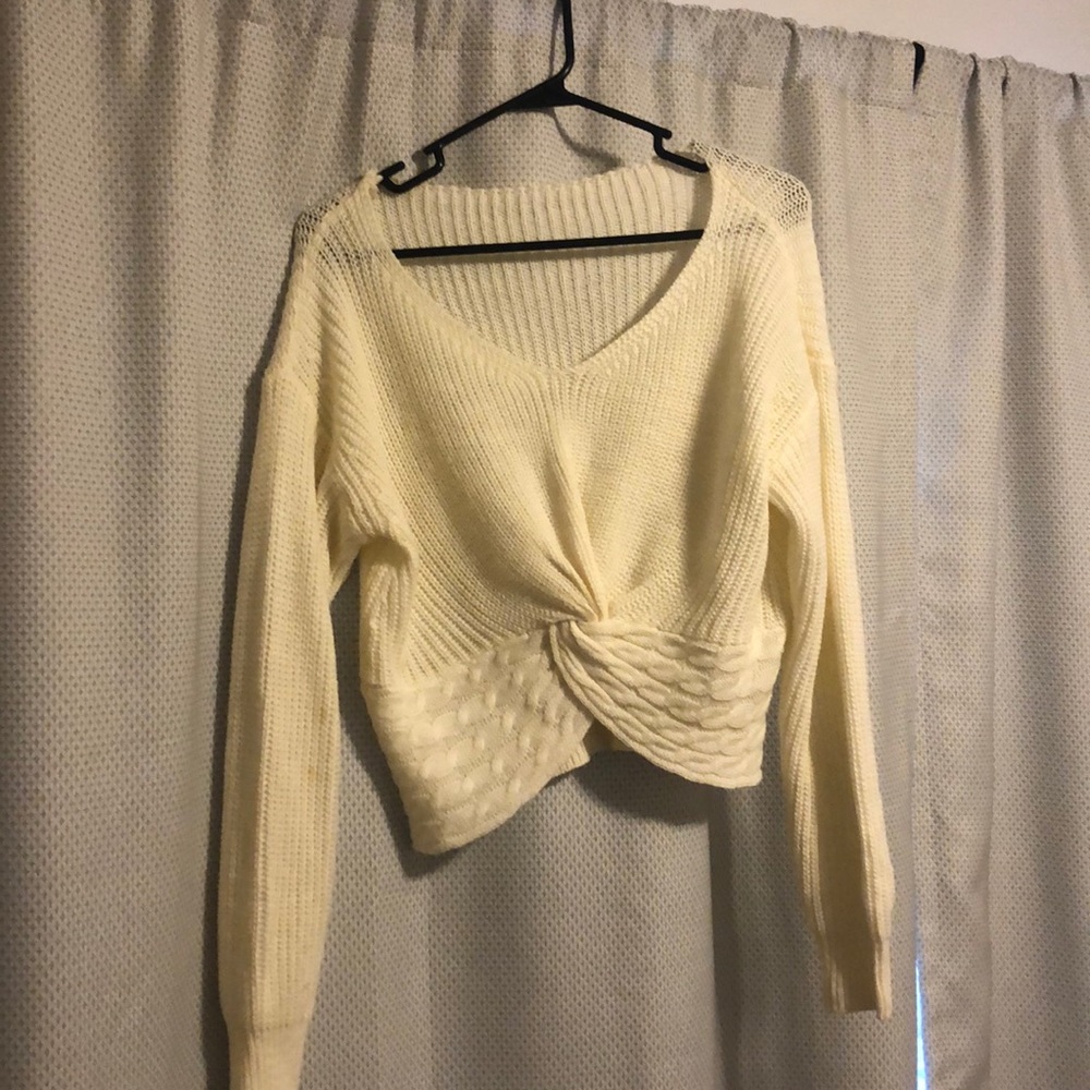 Cream colored, cropped sweater